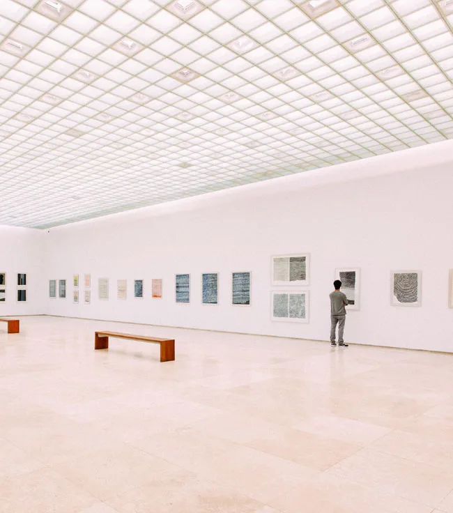 Clean art gallery with polished stone floor