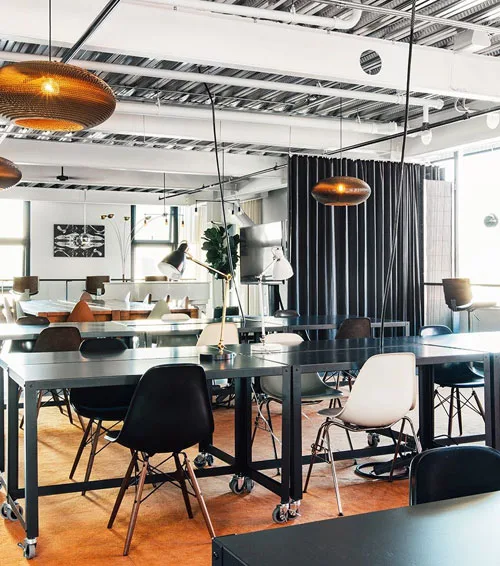 Clean coworking space with shared tables